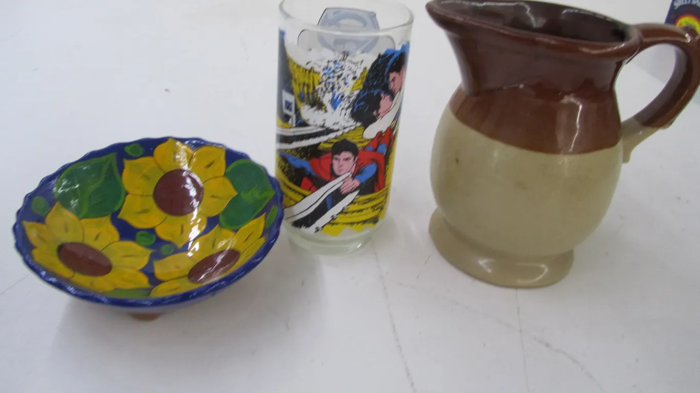 Stoneware Pitcher, Superman Glass, And Hand Painted Pottery Bowl