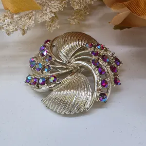 Beautiful Silver Tone Swirl Brooch Faux Aurora Borealis Iridescent Rhinestone Pin