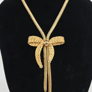 Vintage Napier Gold Tone Mesh Bow Lariat Necklace Tassel Statement Jewelry