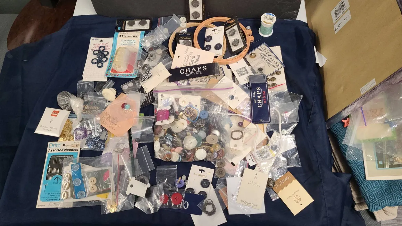 Sewing Notions Collection With Buttons, Needles, and Trims