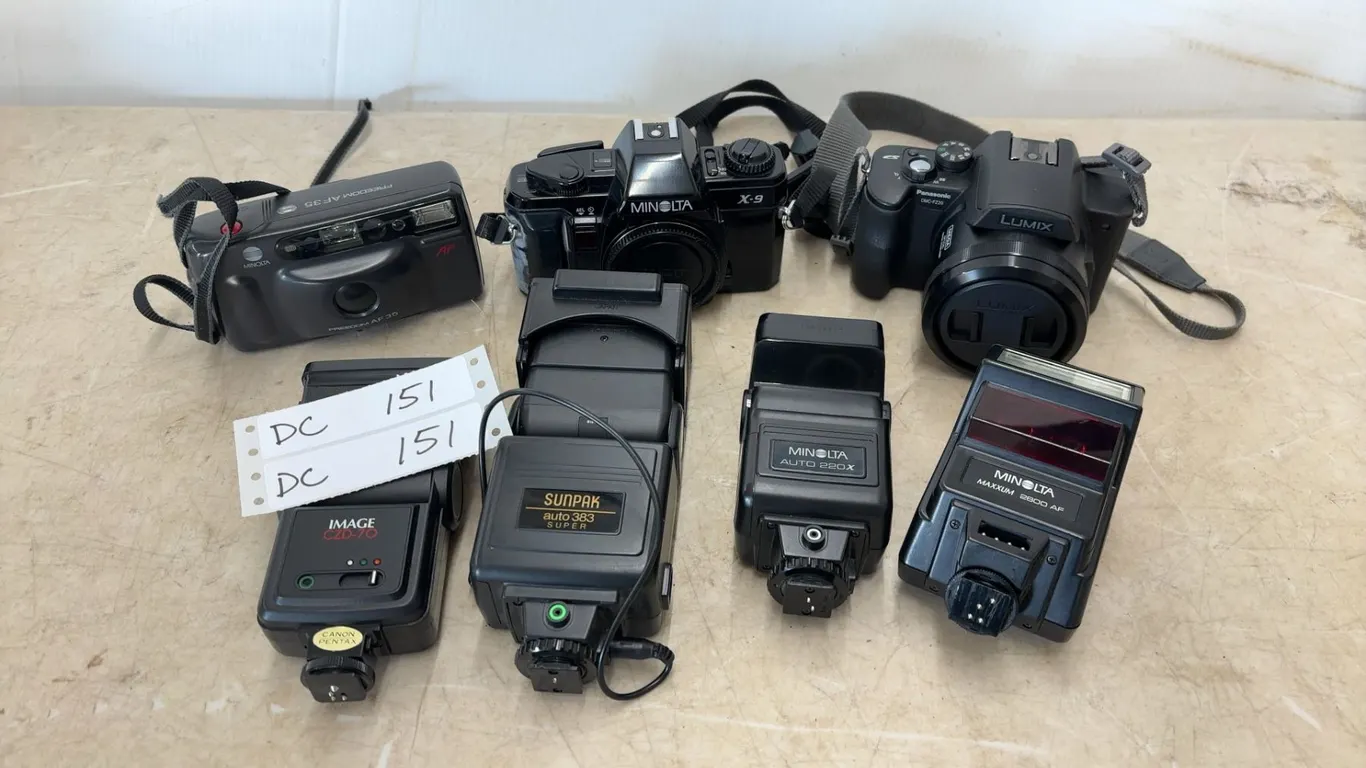 Minolta Freedom AF-35 and X-9 Cameras, Panasonic Lumix DMC-FZ220 Camera, and 4 Flashes
