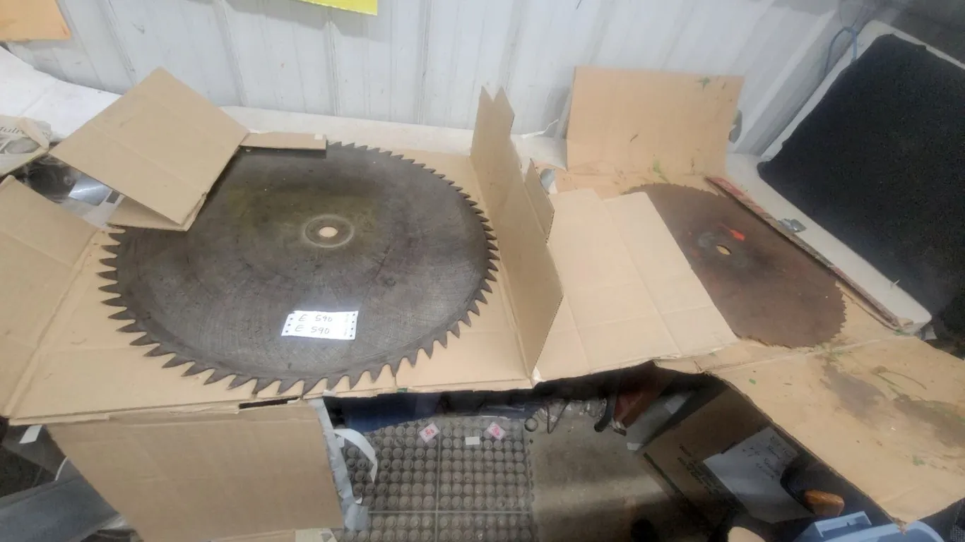 Two Large Circular Saw Blades, 28”" and 24” diameters