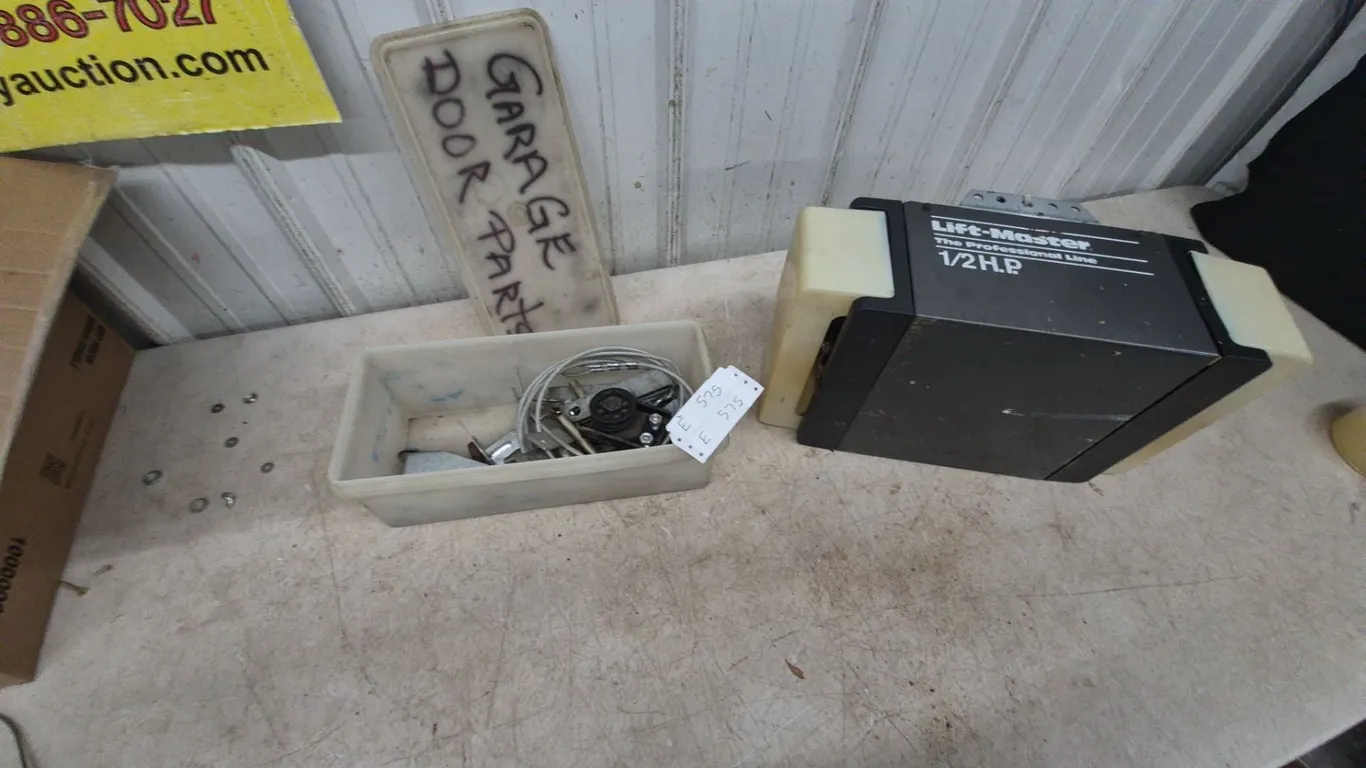 Lift-Master Professional Line 1/2 H.P. Garage Door Opener and Assorted Garage Door Parts