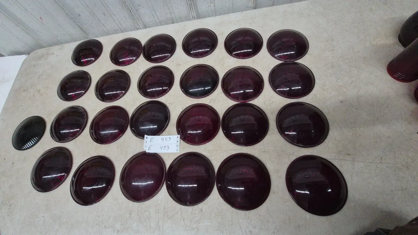 Lot of 25 Red Glass and plastic Lenses. 5” diameter