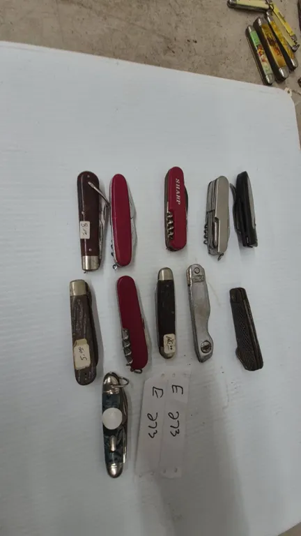11x. Collection of Pocket Knives: Sharp, Swiss Army Style
