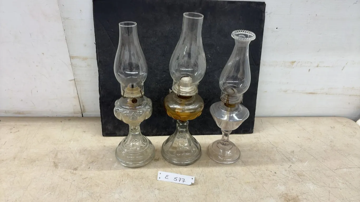 Three Clear Glass Oil Lamps with Pedestal Bases and Chimneys
