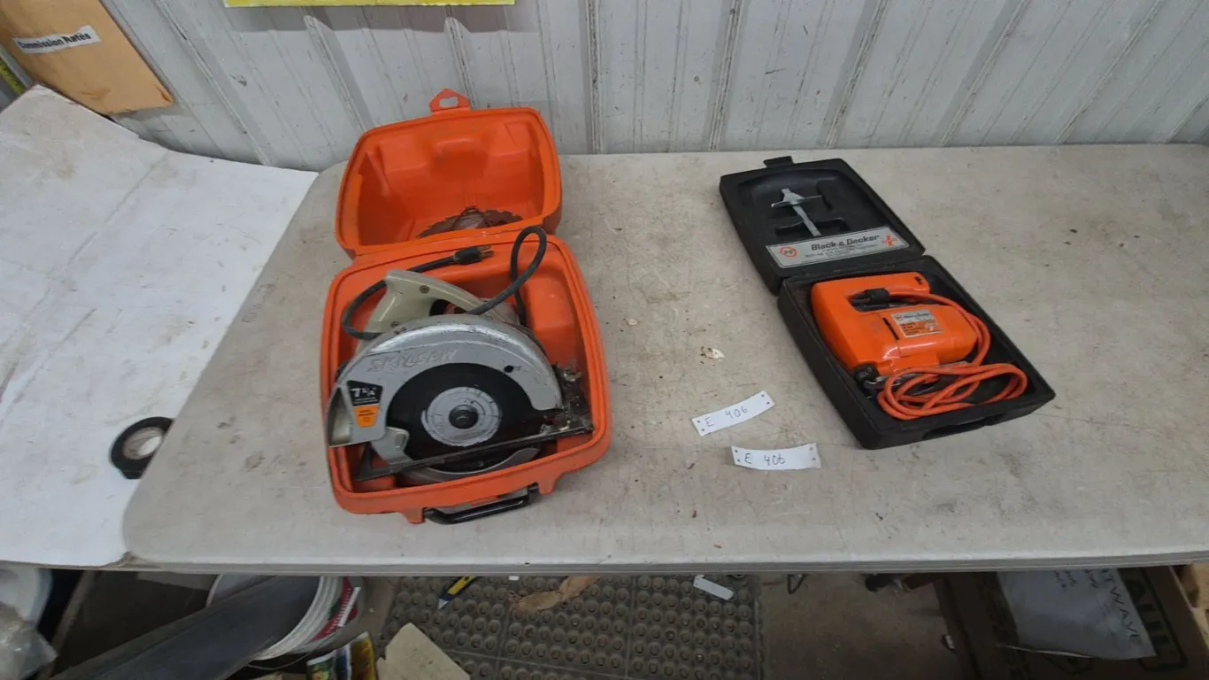 Skilsaw 7 1/4” Circular Saw and Black and Decker Jigsaw in Cases
