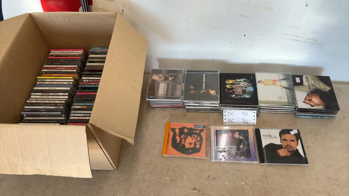 Large Lot of Assorted Music CDs, including R.E.M., Miley Cyrus, Mark Wills