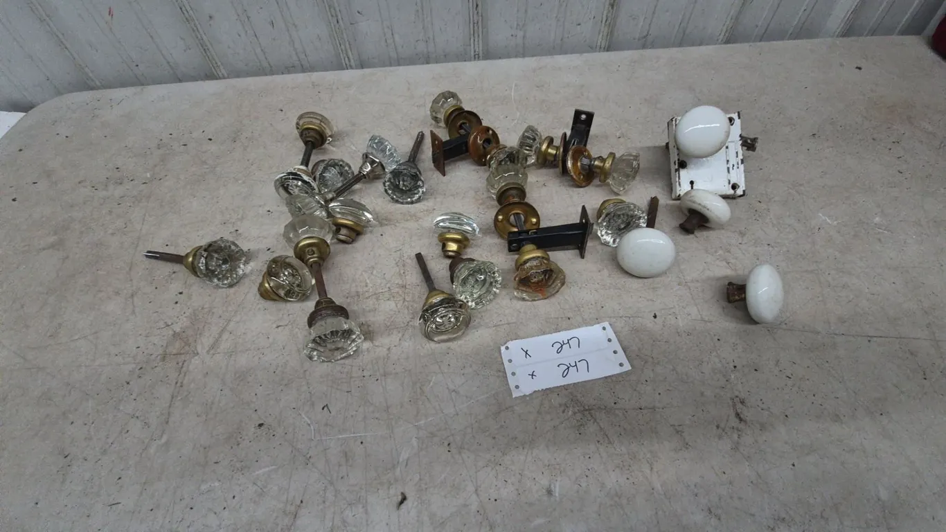 Assorted Glass and Ceramic Door Knobs, Spindles, and Backplates
