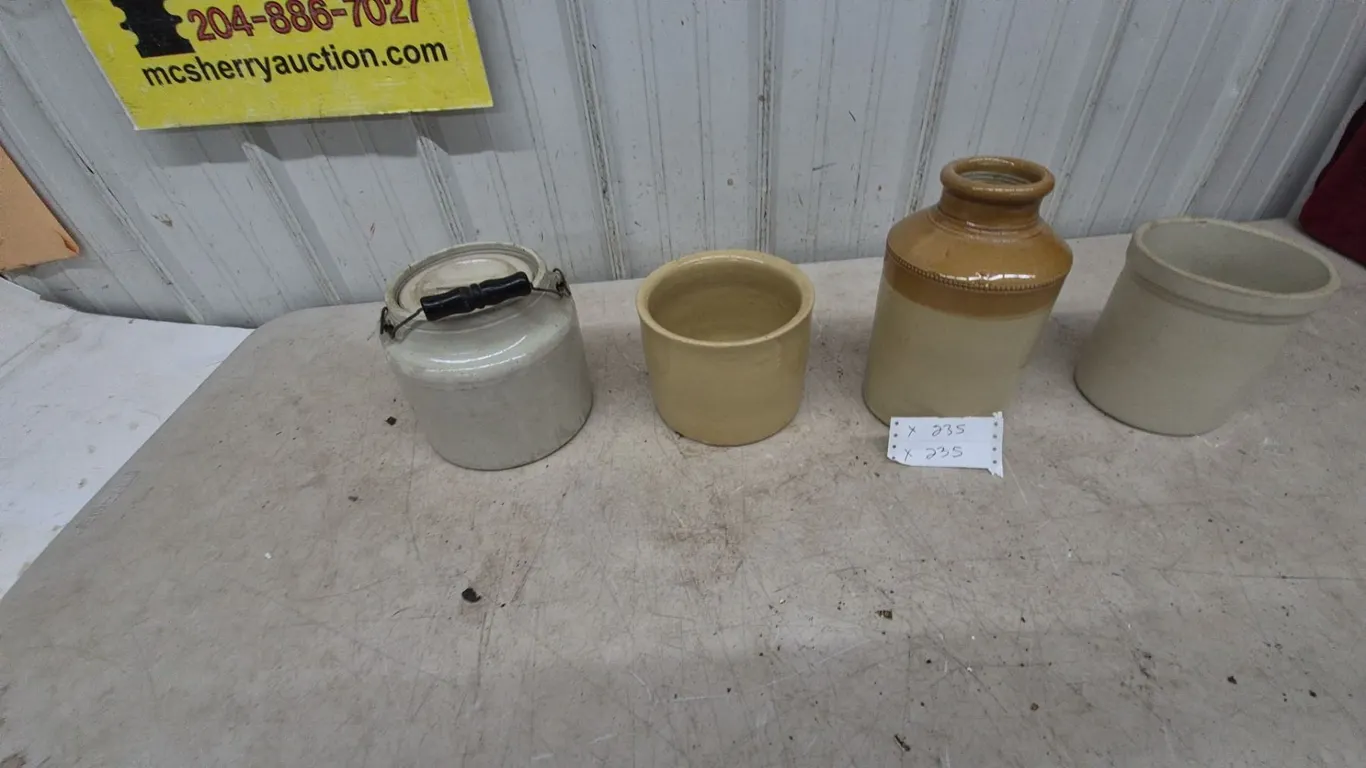Four Stoneware Crocks and Jug: Lidded Crock with Wire Bail and Wood Handle, Small Crock, Jug