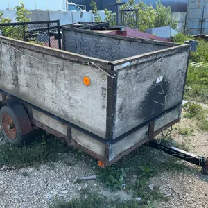7 Ft Single Axle Utility Trailer with Wood Sides and Expanded Metal Ramp Gate