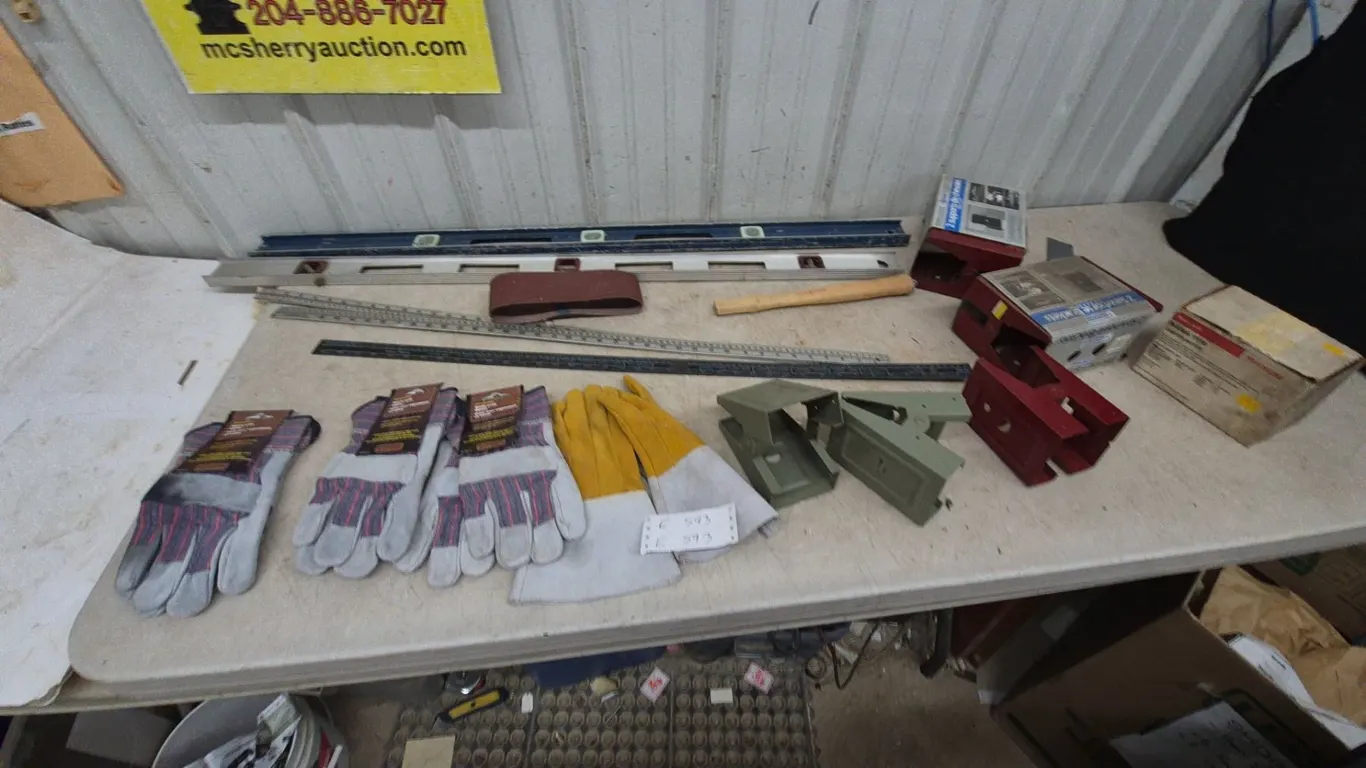 Assorted Levels, Sawhorse Brackets, Work Gloves, Rulers, and Hammer Handle