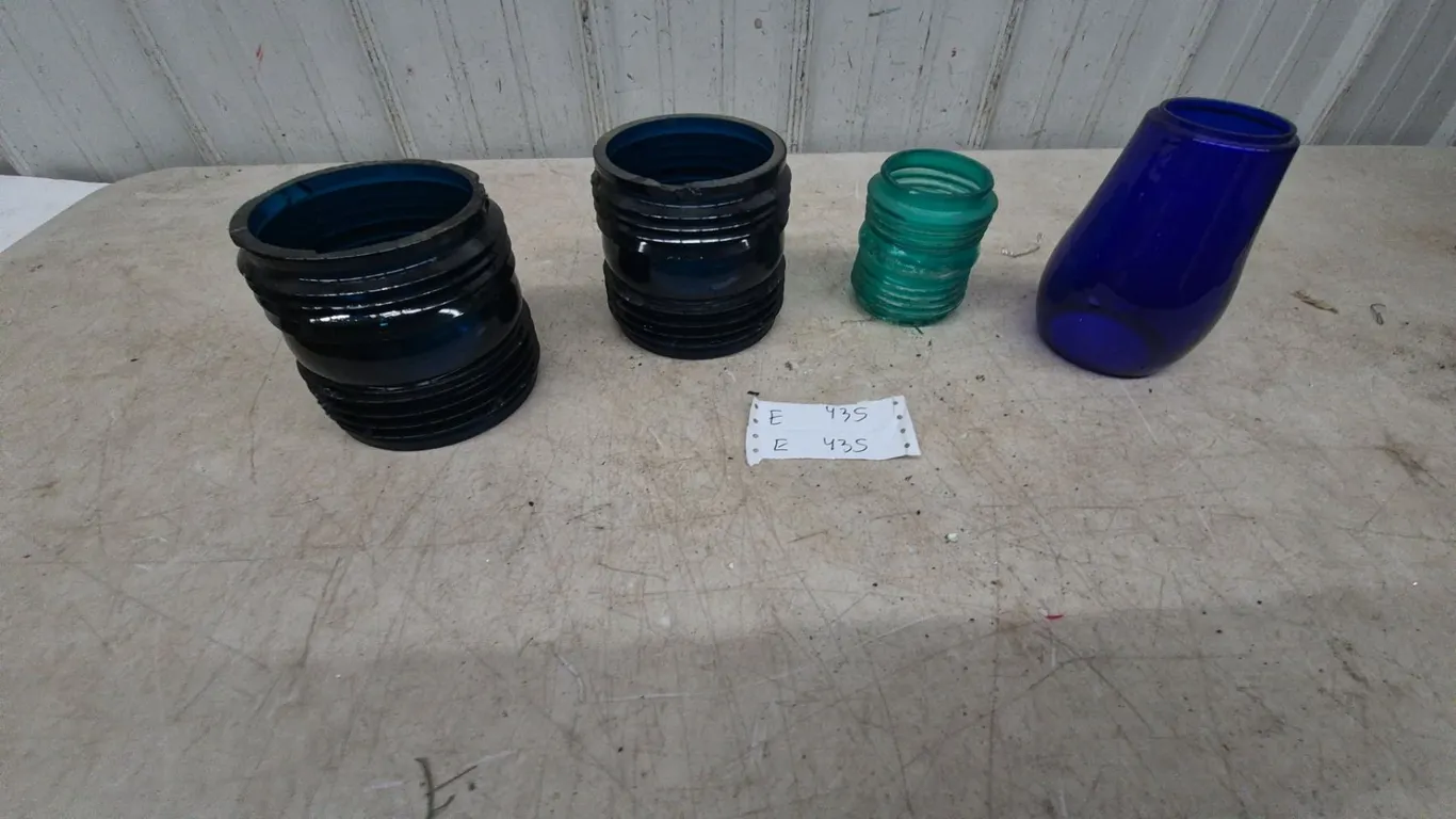 Four Glass lamp fonts Two Dark Blue, One Teal, and One Cobalt Blue