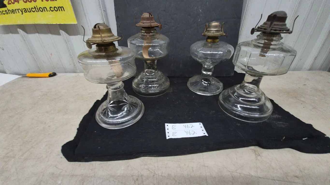 Four Clear Glass Oil Lamps with Metal Burners and Wicks