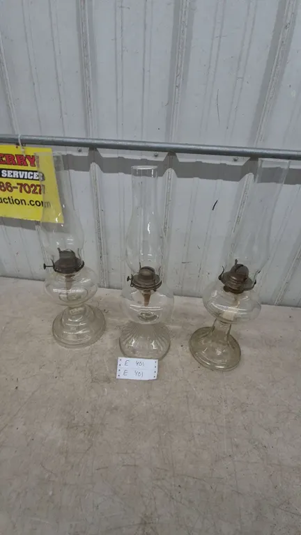 Three Clear Glass Kerosene Lamps with Chimneys and Burners