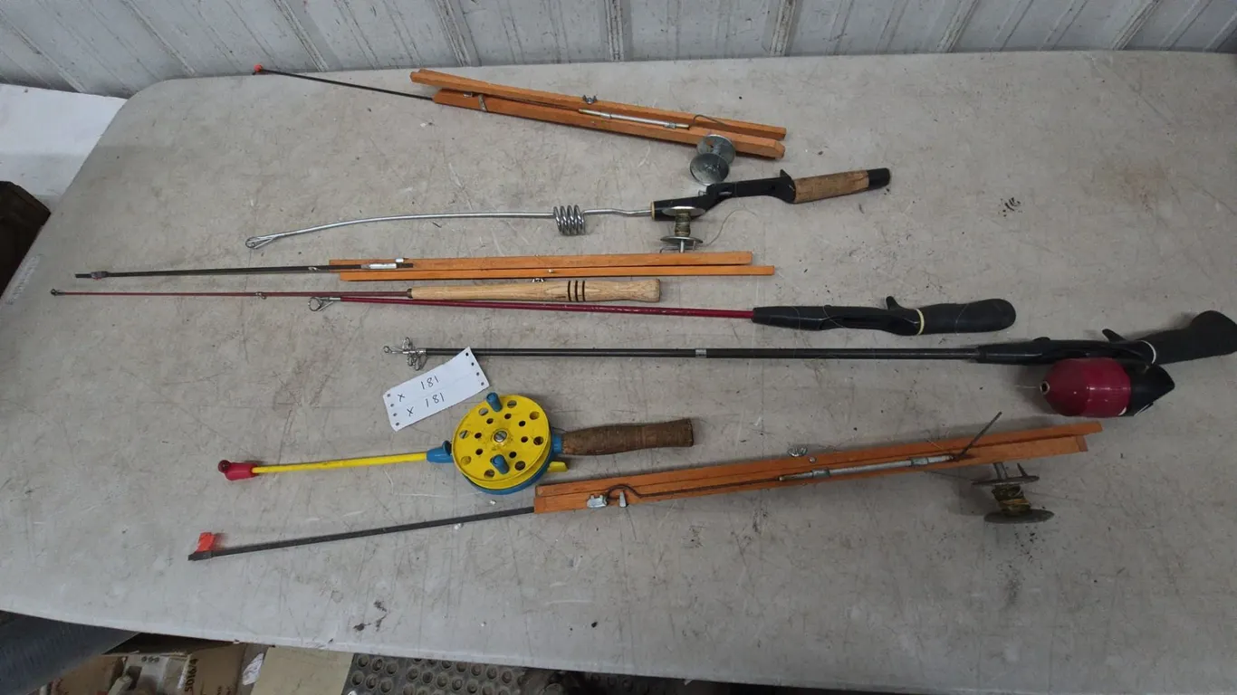 Assorted Ice Fishing Rods and Reels, Including Wooden Tip-Ups and Spool Reels