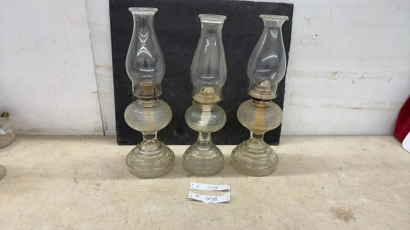 Three Antique Clear Glass Kerosene Oil Lamps With Ribbed Founts and Scroll Pedestal Bases