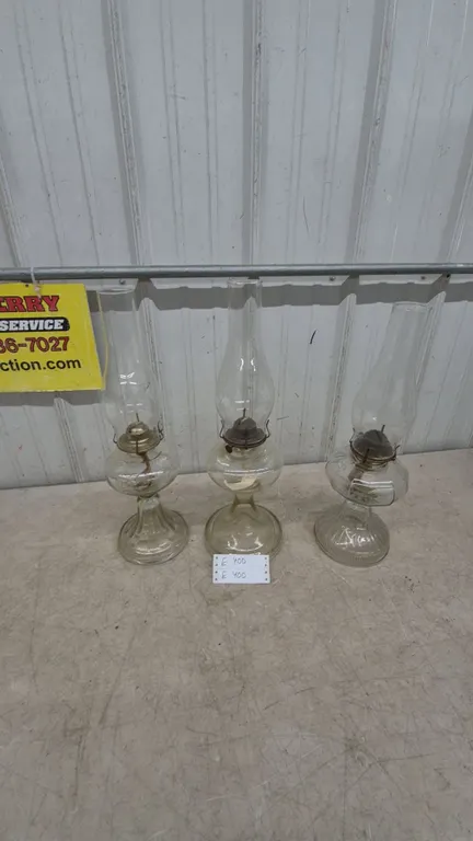Three Clear Glass Oil Lamps with Chimneys and Wicks