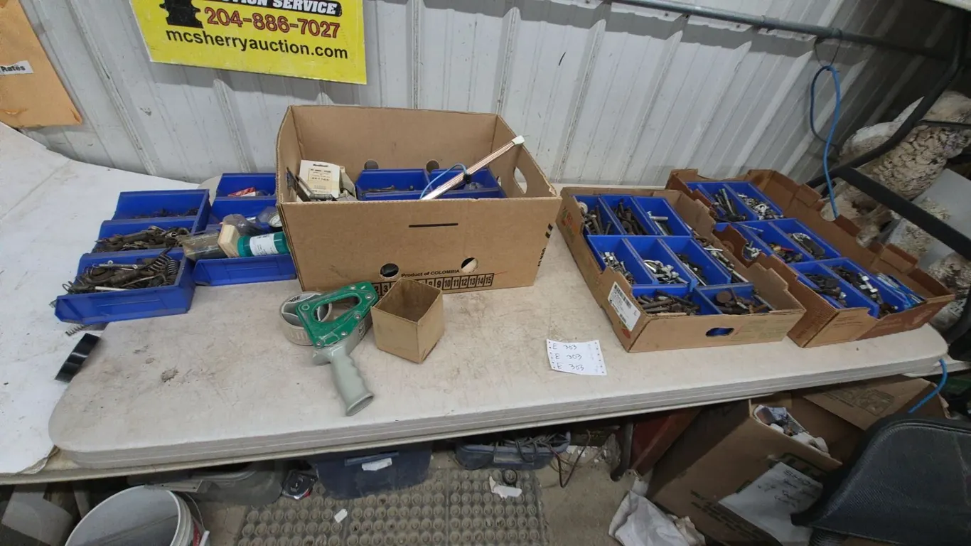 Assorted Hardware: Bolts, Nuts, Washers, Screws, and More in Blue Bins. 3 boxes full