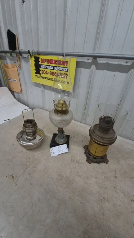 Three Antique Oil Lamps: Frosted Glass and Brass Lamp with Figural Base, and Two Metal Lamps