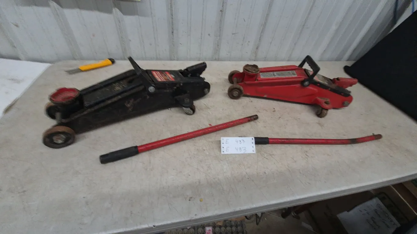 Two Floor Jacks and Two Jack Handles
