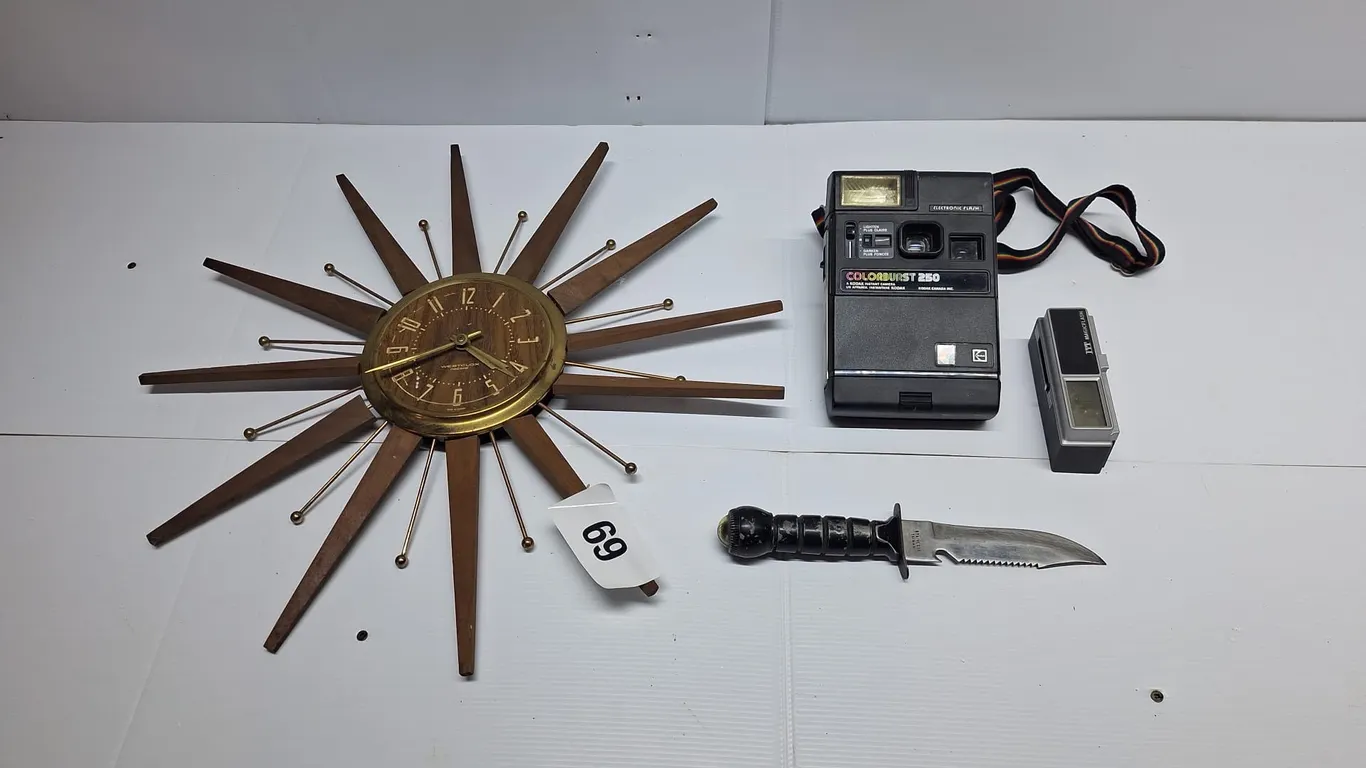 Clock. Camera and hunting knife with compass
