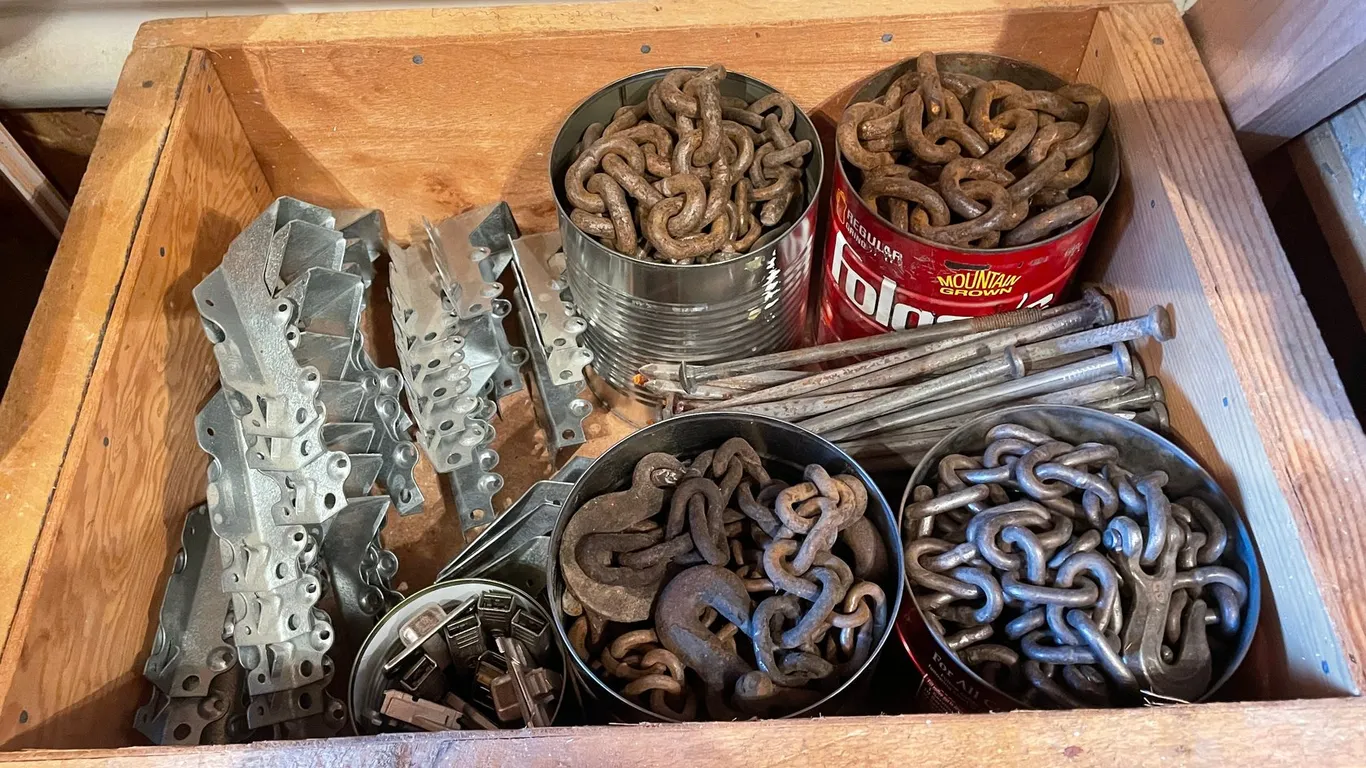 (1) Large Bin of Assorted Logging Chain Pieces