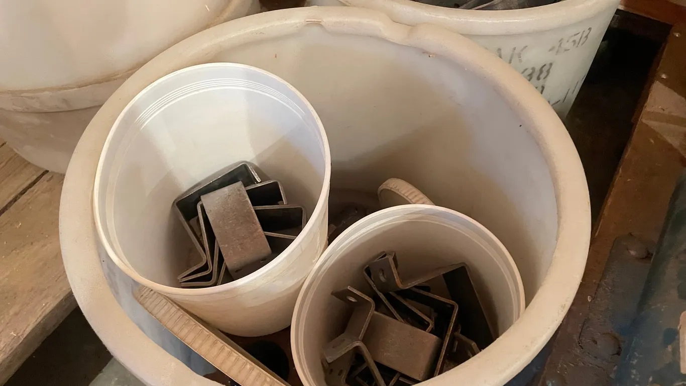 (4) Bins of Various Sized Iron Weights and Brackets