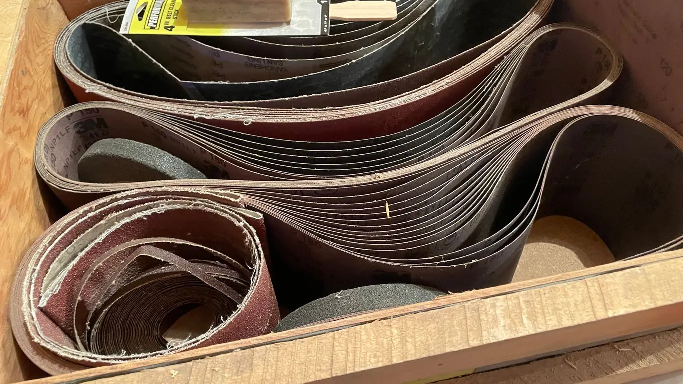 (1) Large Bin of Sanding Belts