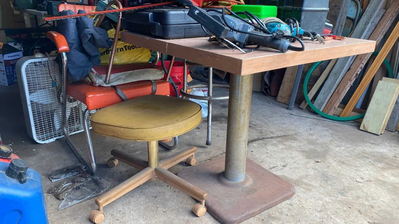 Wooden Table with Assortment of Chairs