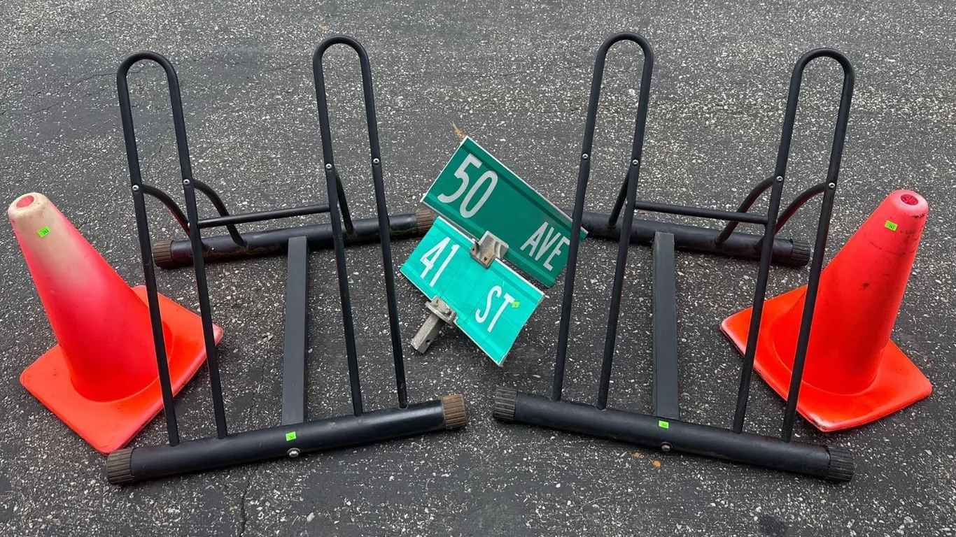 Street Sign, Safety Cones, and Metal Bike Racks