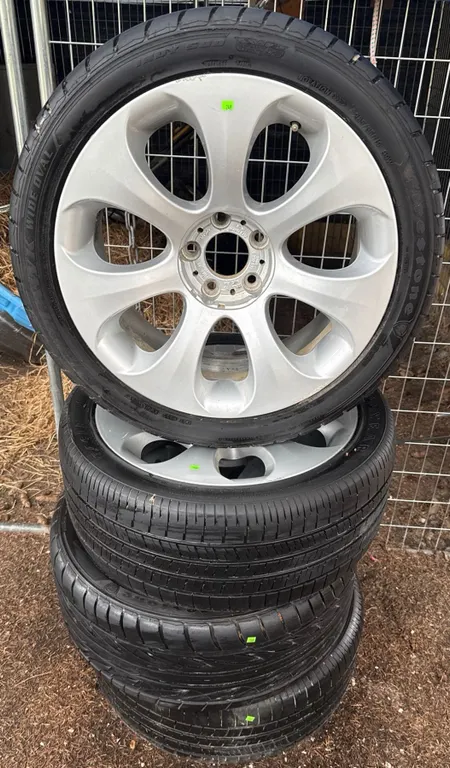 4 Firehawk Wide Oval 285/35R19 Tires with 5-Spoke Alloy Wheels