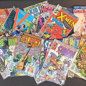 Comic Books and Two Comic Book Slab Holders
