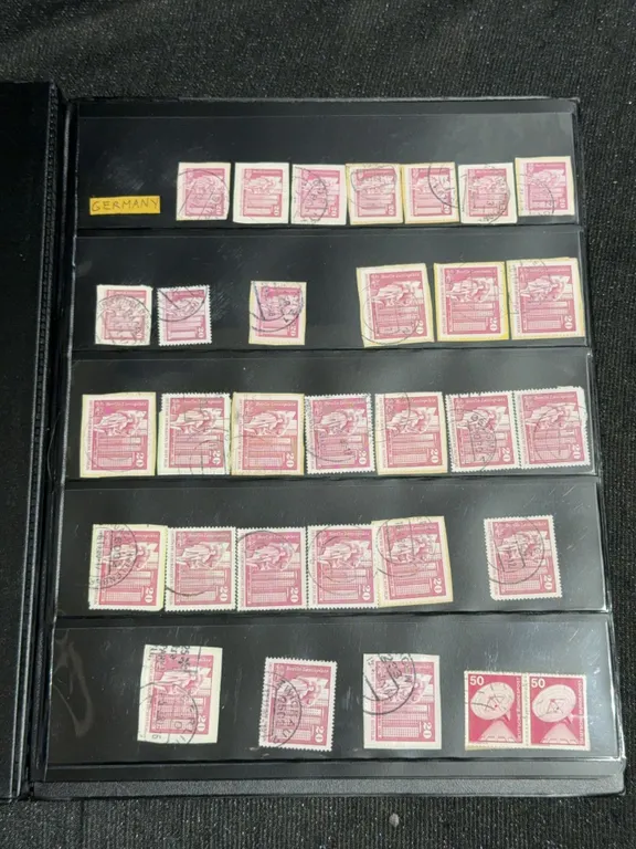 Album of 786 Mixed Germany and Canada Postage Stamps