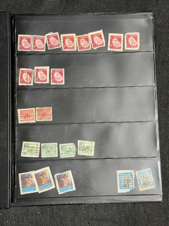 Album of 218 Canadian Stamps, Various Designs and Eras
