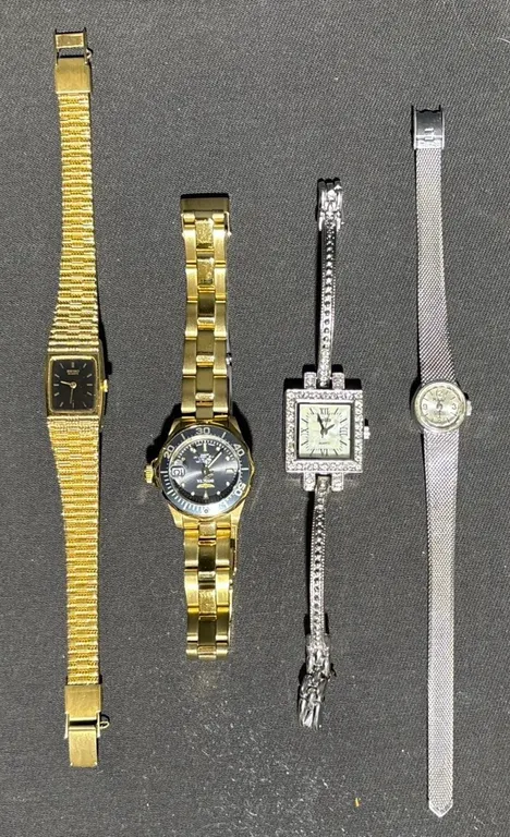 Four Women’s Watches: Seiko, Invicta, and Two Silver-Tone Bracelets
