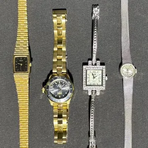 Four Women’s Watches: Seiko, Invicta, and Two Silver-Tone Bracelets