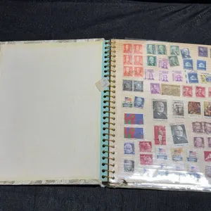 Stamp Album Containing 735 Mixed World Stamps