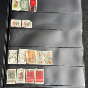 Album of 295 Canadian Postage Stamps in Black 'Uncle Paul' Binder