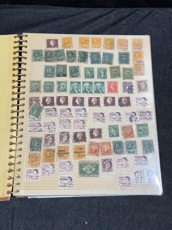 Album of 792 Canadian Postage Stamps Assorted Eras and Designs