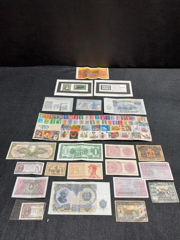 World Banknotes and Stamp Collection Including US Air & Space Stamps