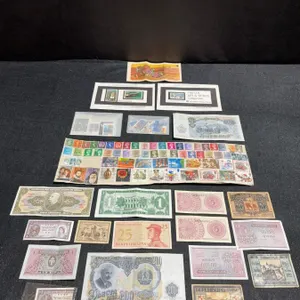 World Banknotes and Stamp Collection Including US Air & Space Stamps