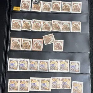 Album With 368 Assorted Italian and International Postage Stamps