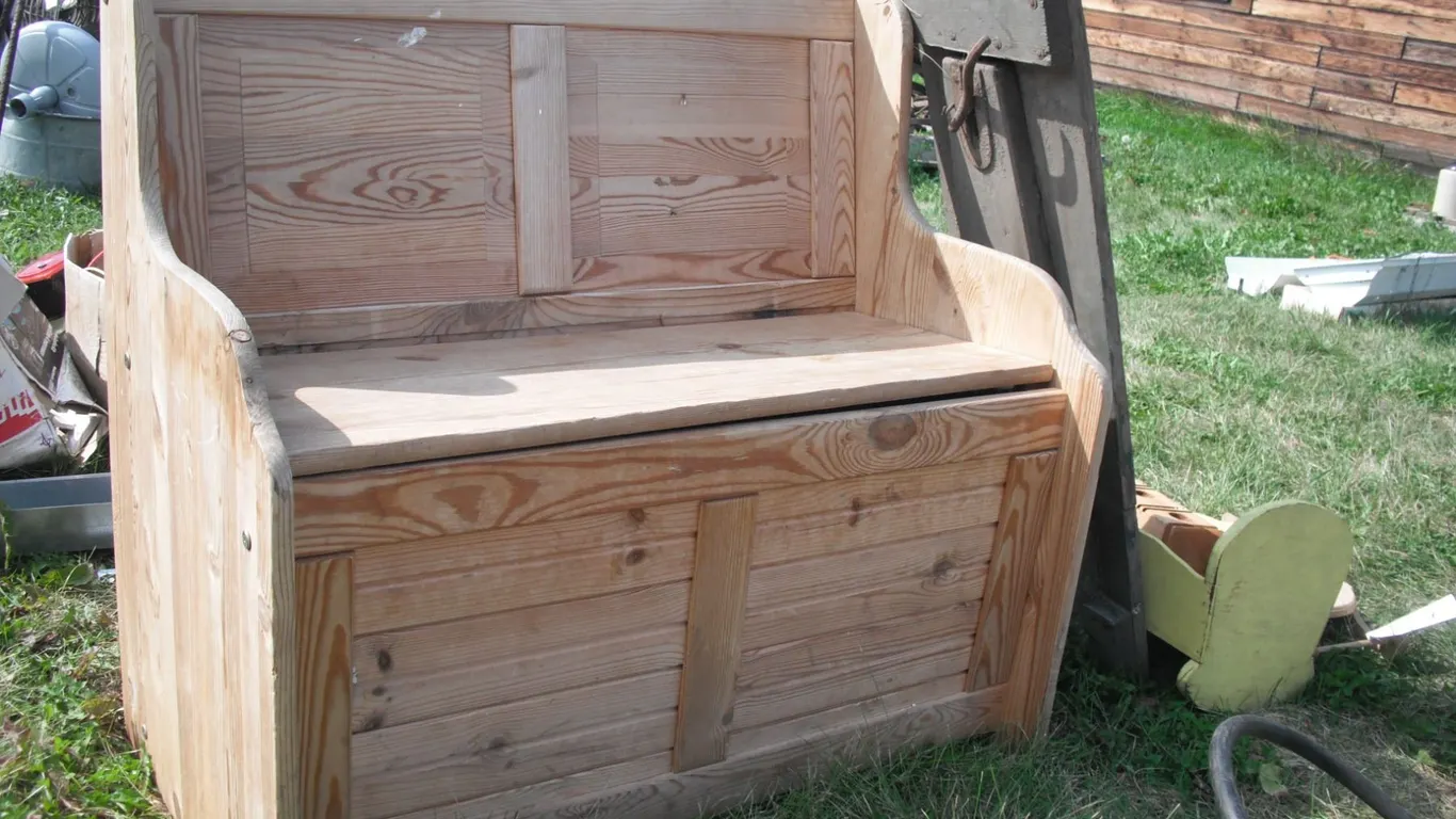 wooden storage bench with wooden décor items