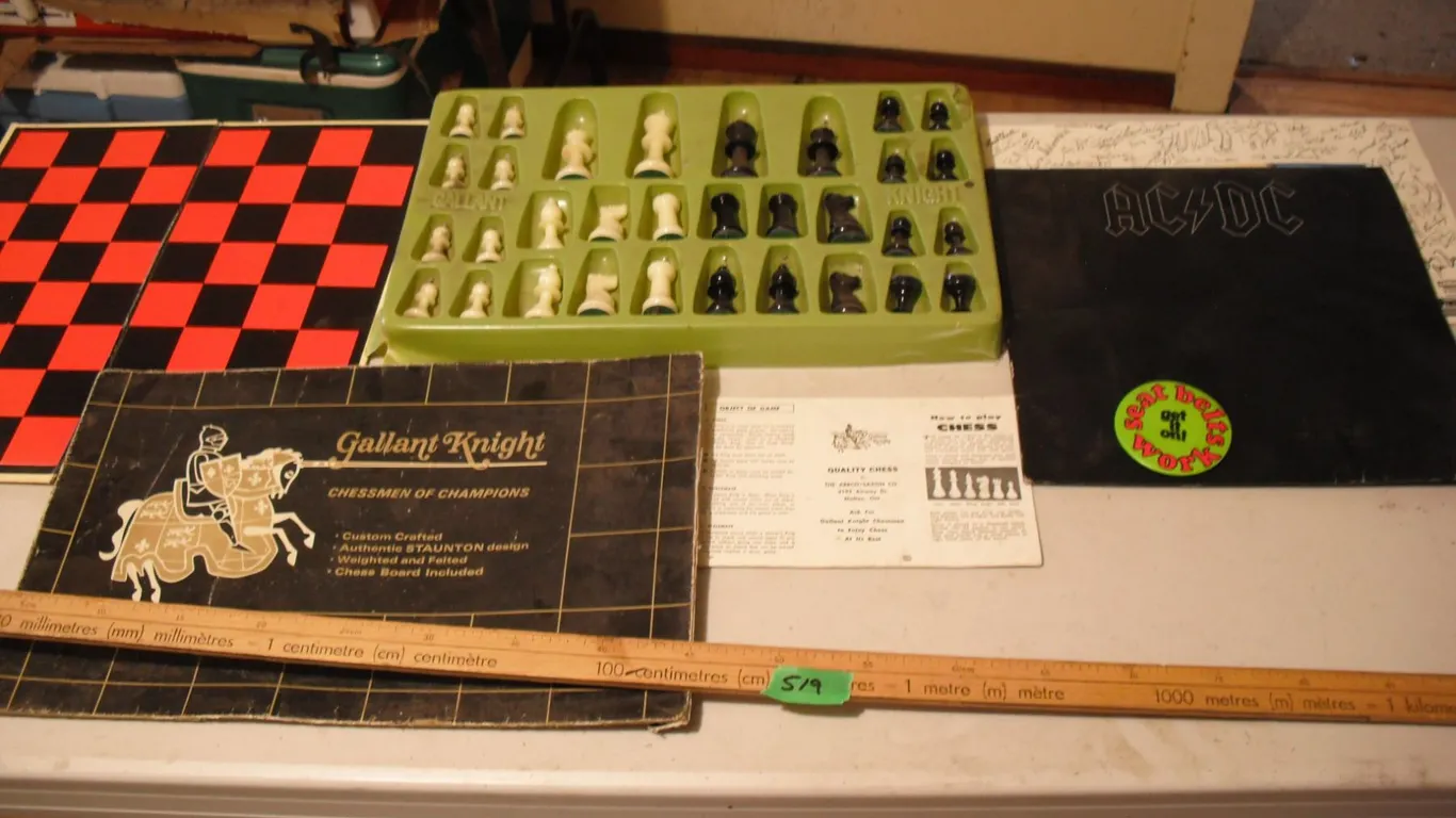 Chess set, roughriders signed picture & ACDC record