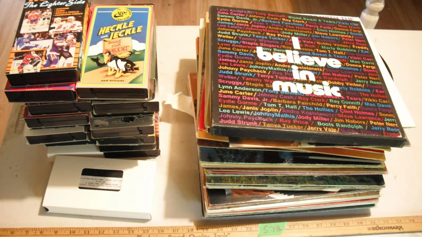 assorted records & VHS tapes