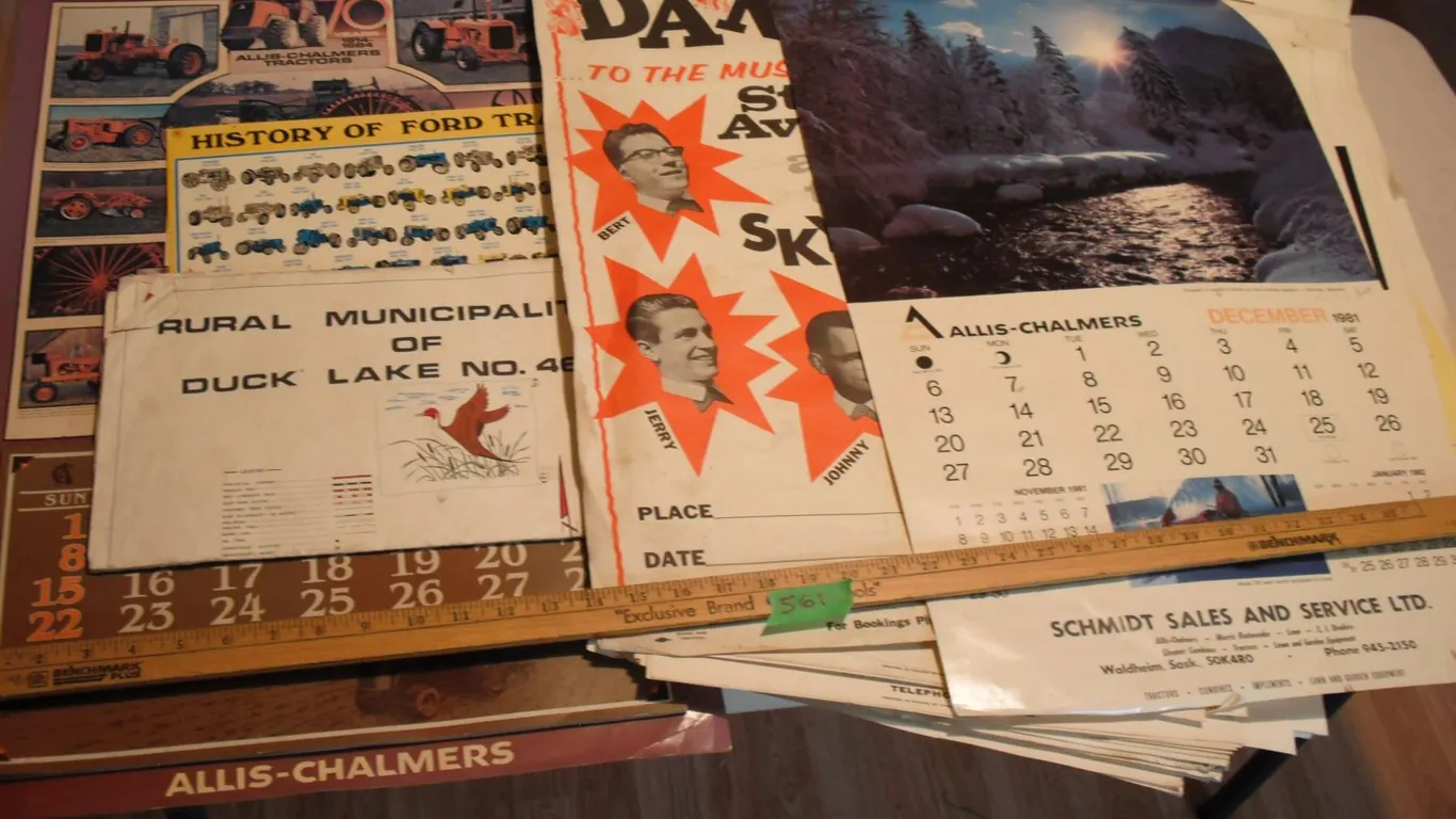 Allis Chalmer calendars and assorted music posters