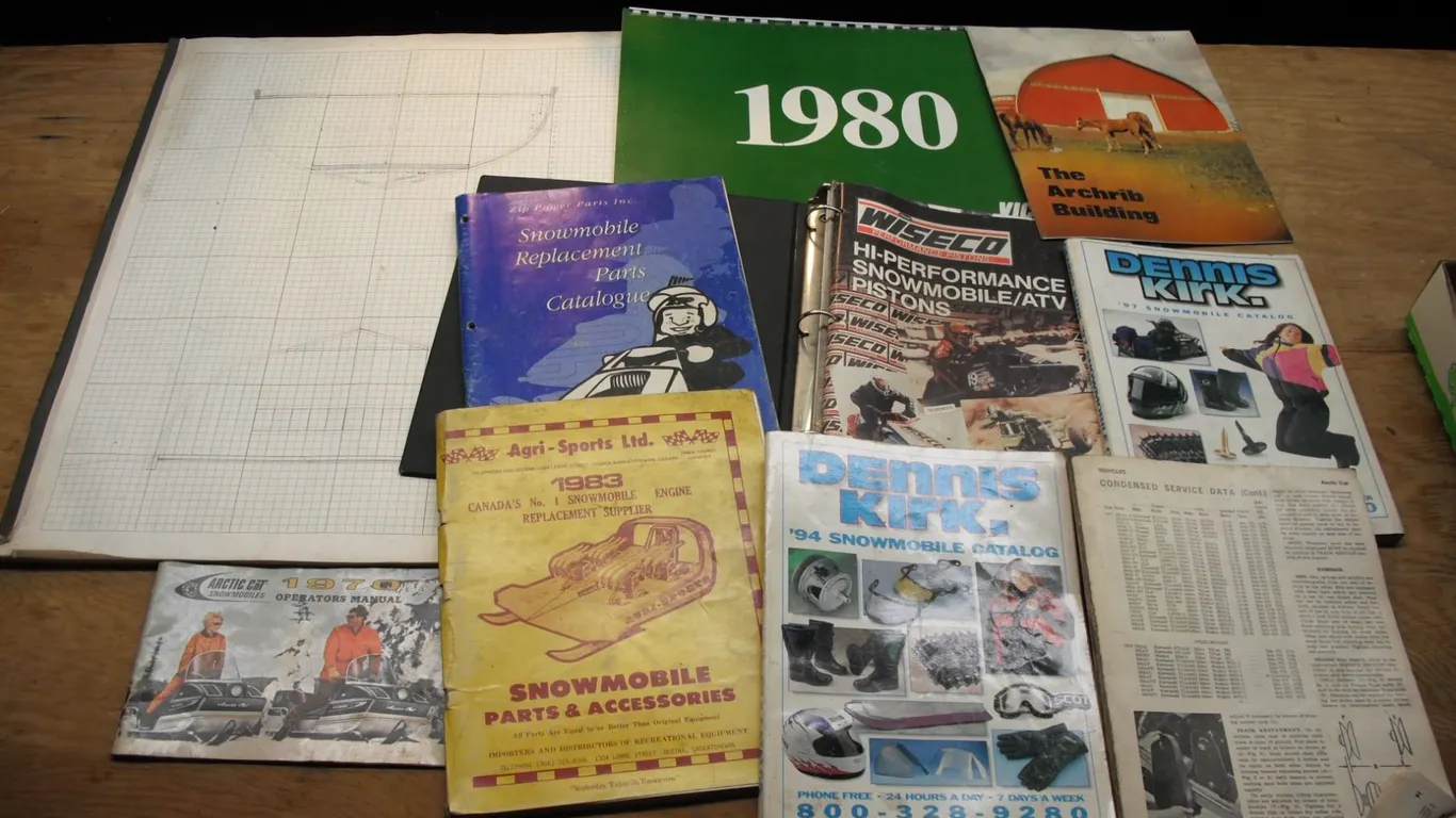 snowlobile parts catalogues and 1970 Artic Cat manual