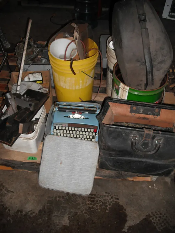 pallet lot - Webster typewriter, steel pieces, engine parts, Castrol oil pail, screws, etc.