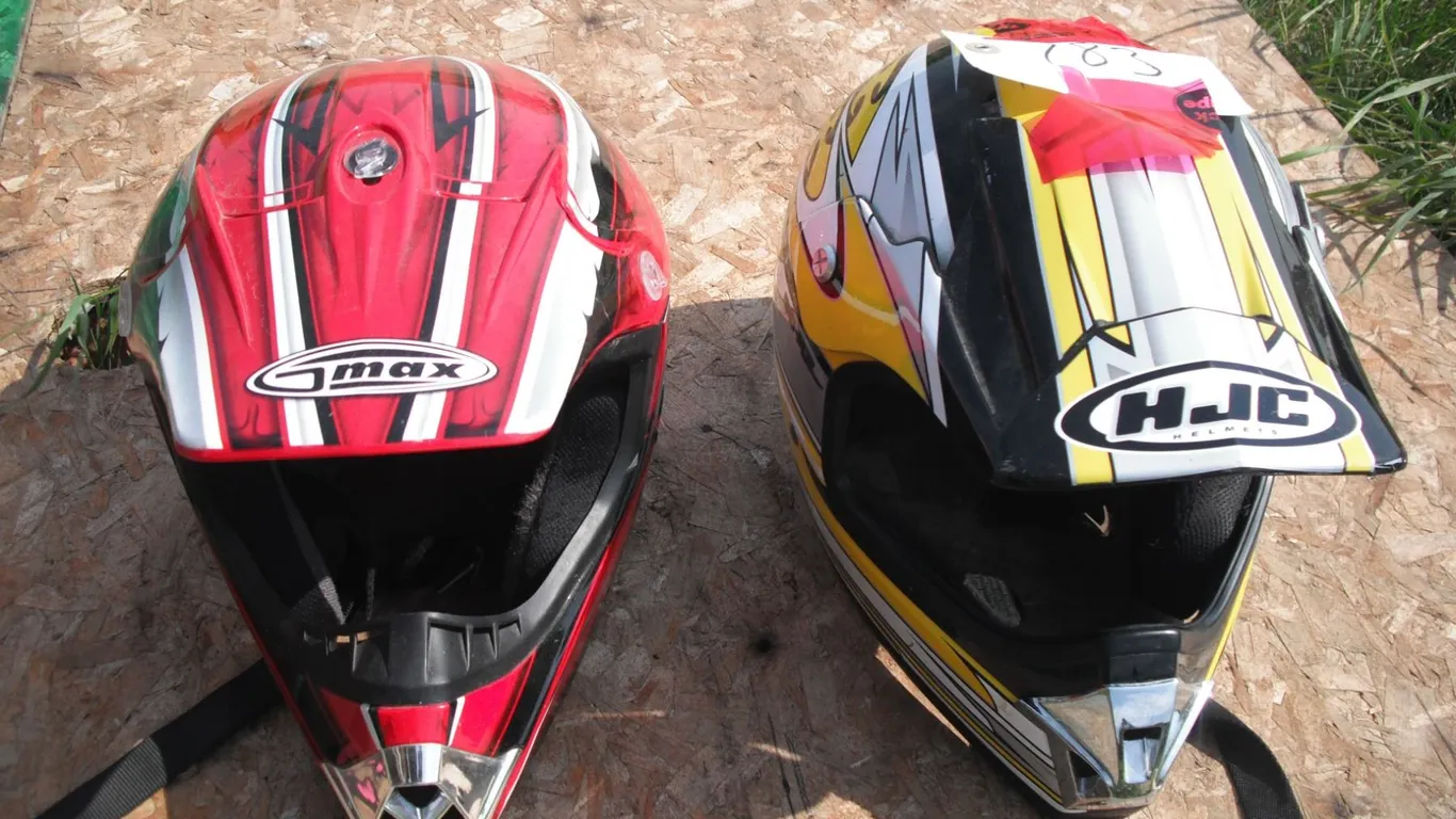 2 atv helmets - size small and youth medium